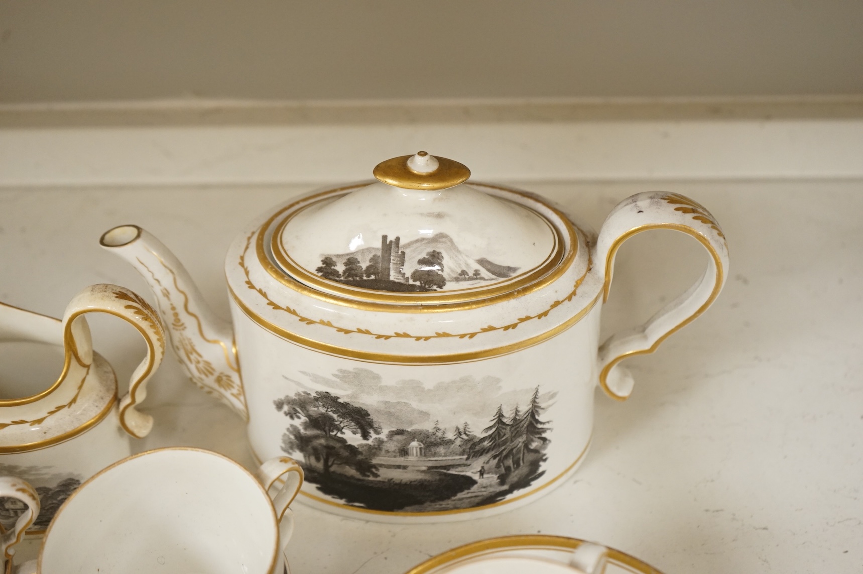 A Spode bat-printed part tea / coffee set, c.1802, including pattern 557, largest 26cm wide